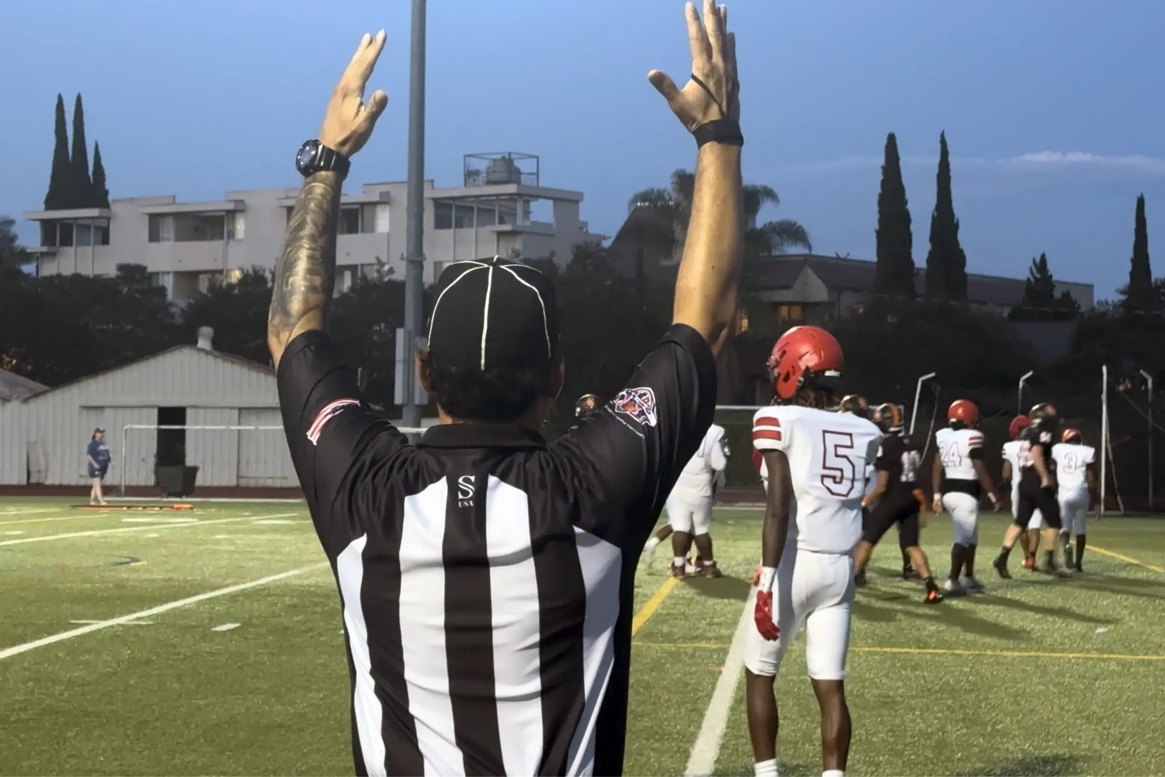 A referee signals Beverly Hills High School's first offensive touchdown of the season during the Normans' home opener against Centennial on Aug. 28.