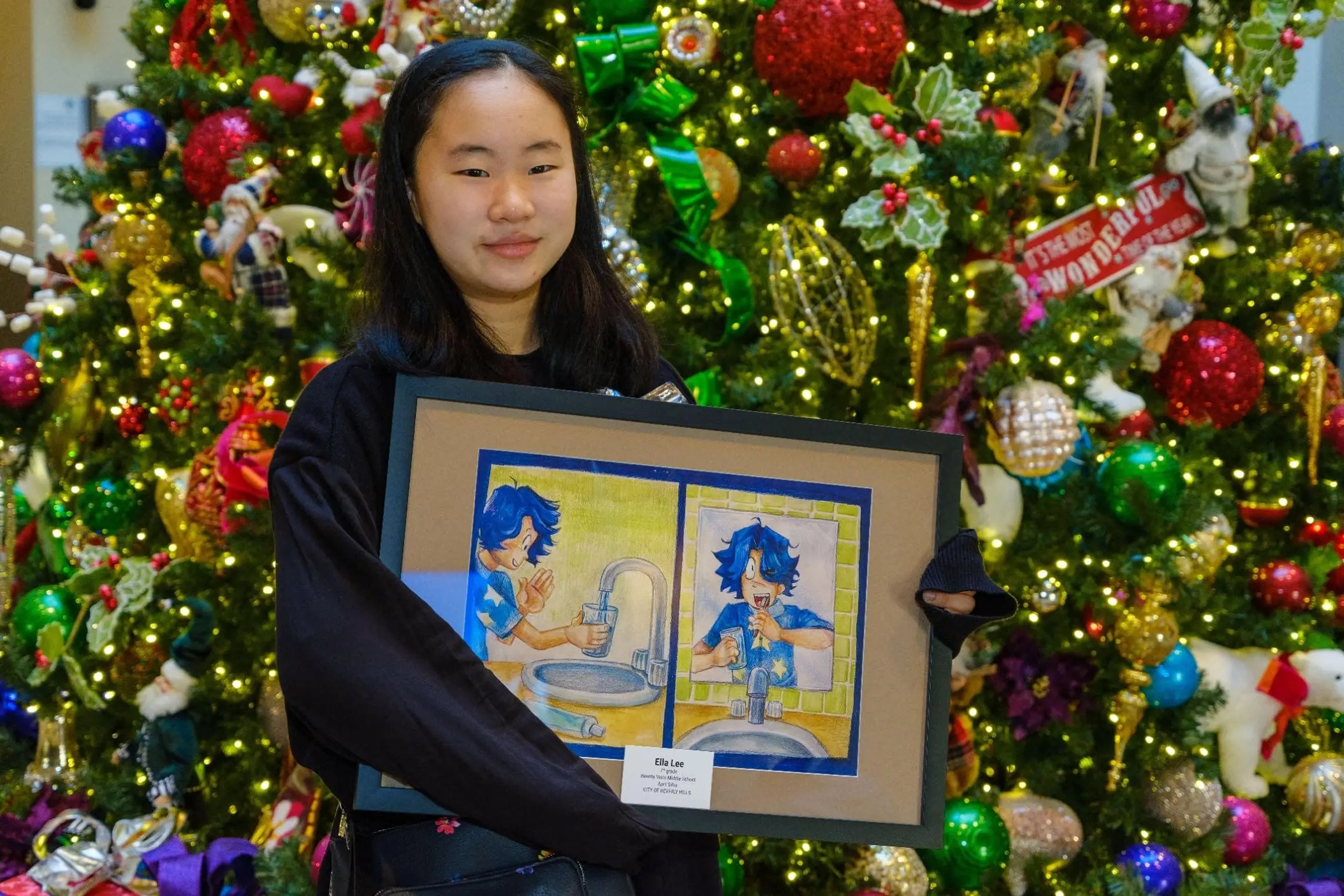 Beverly Vista Middle School Student Ella Lee, representing BHUSD and the City of Beverly Hills, holds her artwork selected for the Metropolitan Water District’s 2026 Being Waterwise Student Art Program