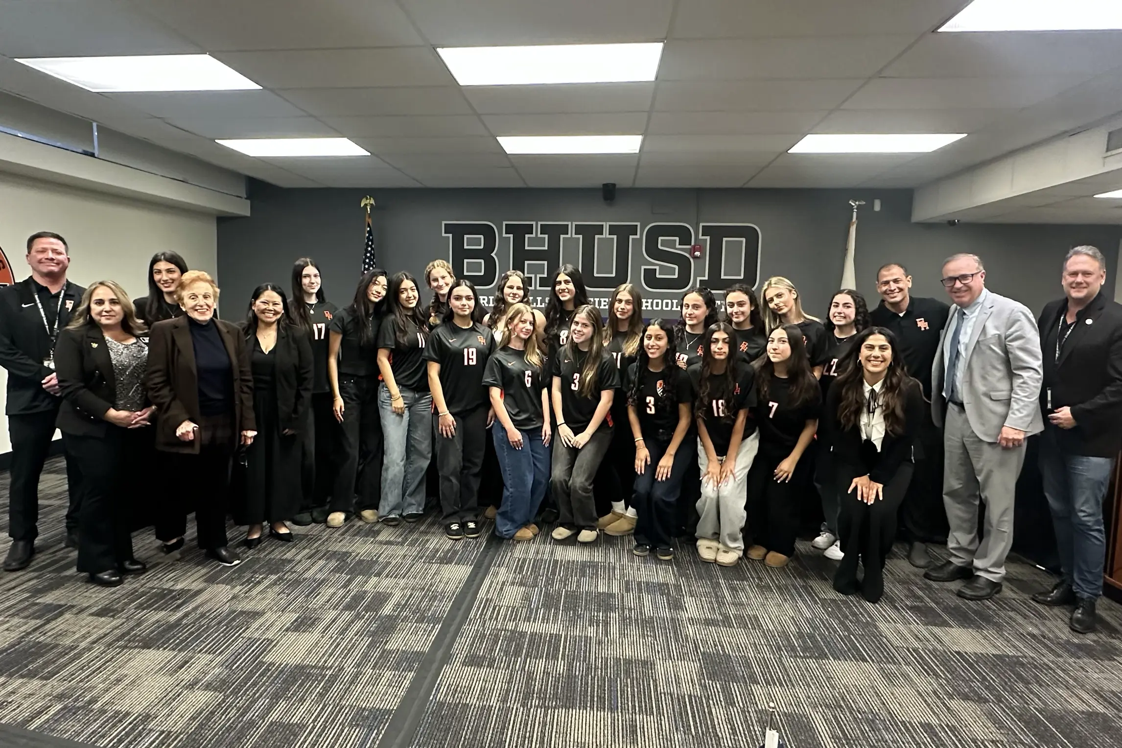 BHHS girls varsity soccer players pose with the Beverly Hills Unified School District Board of Education during recognition at the Feb. 24 board meeting.