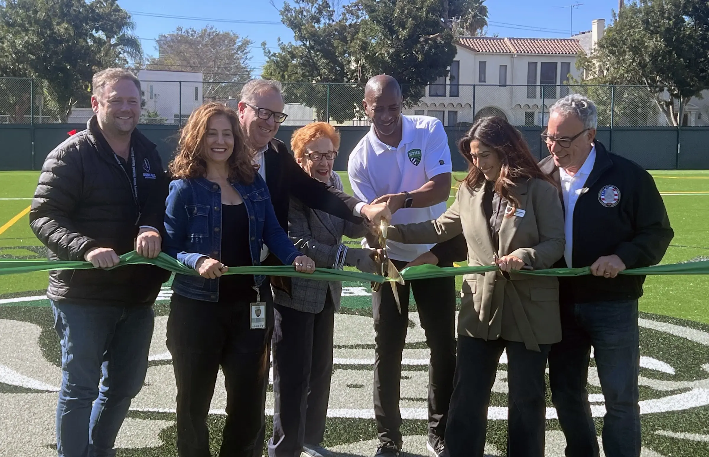 BHUSD leaders join city officials for the ribbon cutting of the newly completed athletic field at Beverly Vista Middle School.