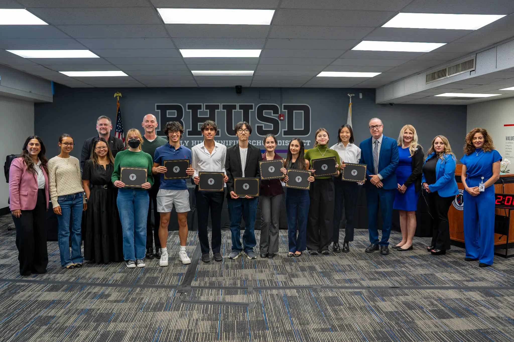 BHHS Commended Students hold certificates alongside district representatives at the October 13, 2026 Board of Education meeting.