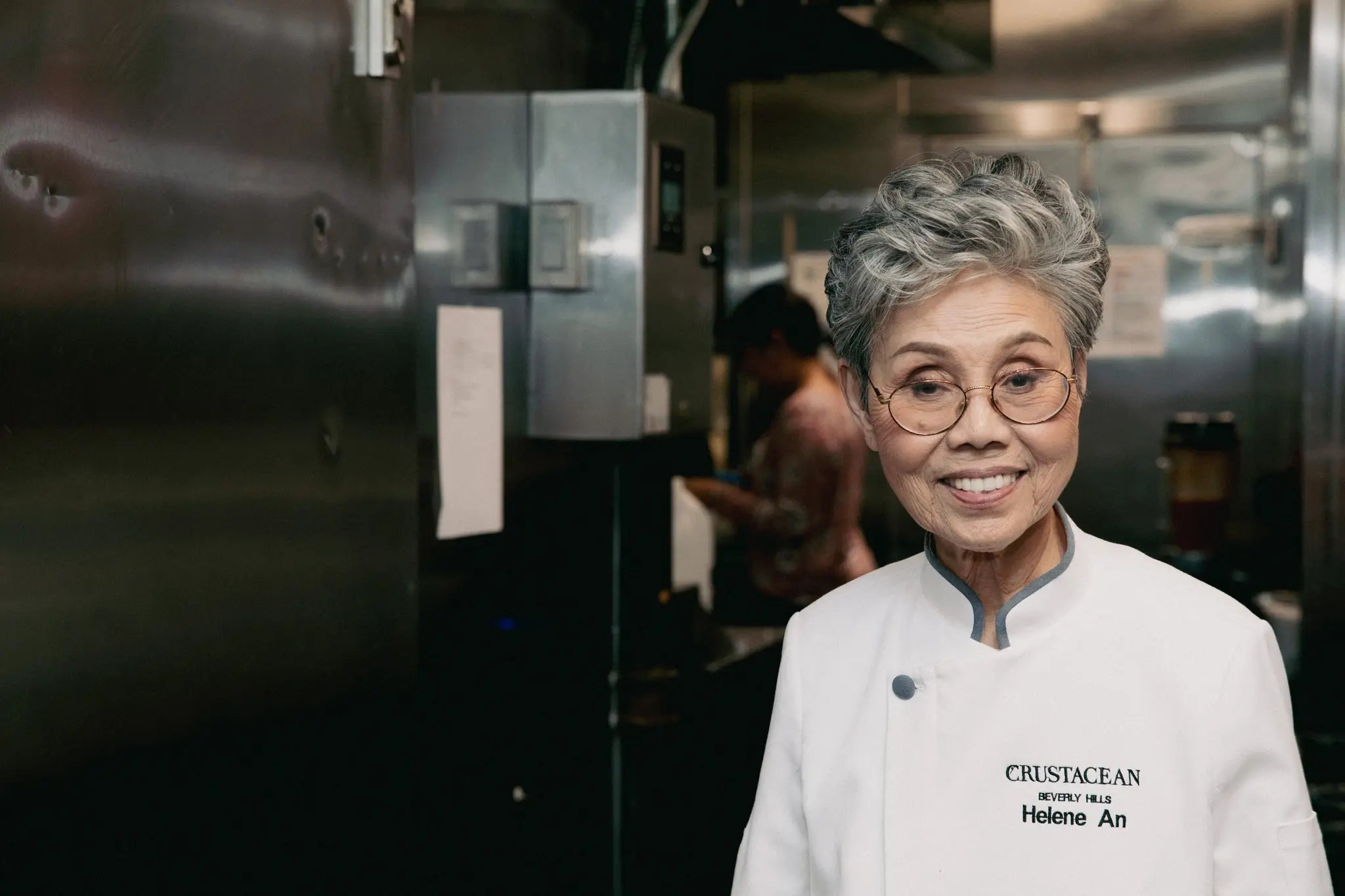 Master Chef Helene An, known as the “Mother of Fusion Cuisine,” stands inside the kitchen at Crustacean Beverly Hills, the An family’s landmark restaurant on North Bedford Drive.