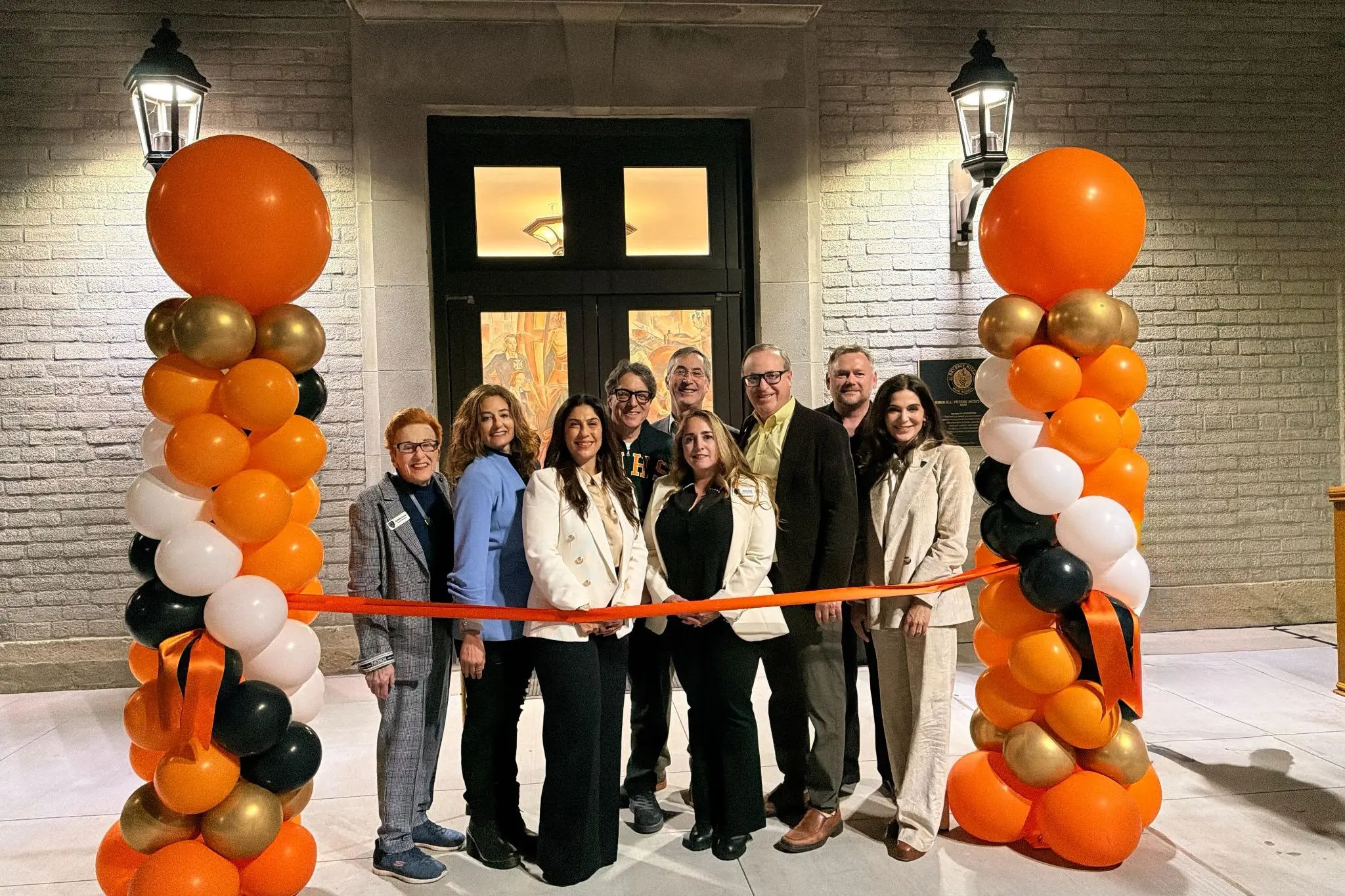 The BHUSD Board of Education and the Beverly Hills City Council gather to cut the ribbon and celebrate the grand reopening of the K.L. Peters Auditorium.