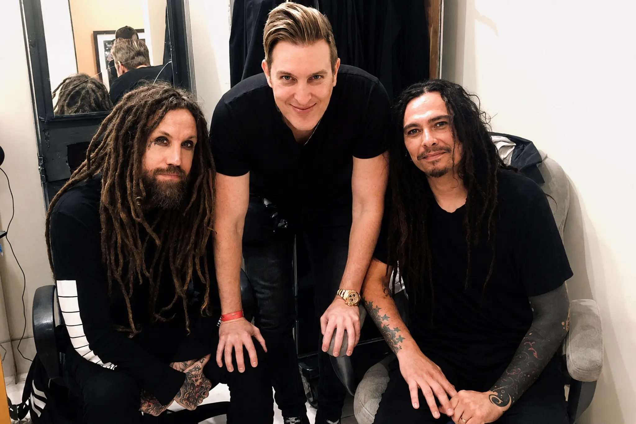 Velvet Hammer founder and CEO David "Beno" Benveniste backstage with Brian "Head" Welch and James "Munky" Shaffer of Korn