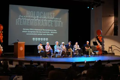 Holocaust Survivors Grace Peters Auditorium in Historic BHHS Assembly