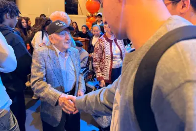Joseph Alexander, 103, survivor of twelve concentration camps, speaks to BHHS students at the International Holocaust Remembrance Day event on January 27, 2026